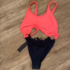 Designer one piece xs- never worn